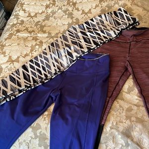 Three leggings for exercise 2 large one medium fits like large.